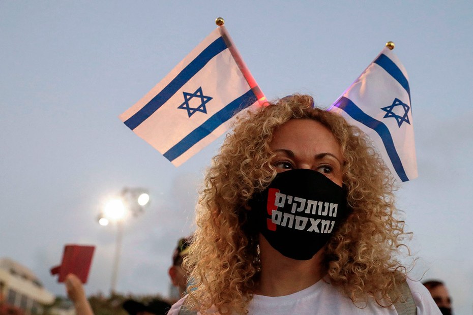 Auch Protest mit Maske ist in Israel derzeit nicht gern gesehen