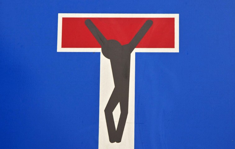 Das Kreuz mit der Kirche und den Atheisten