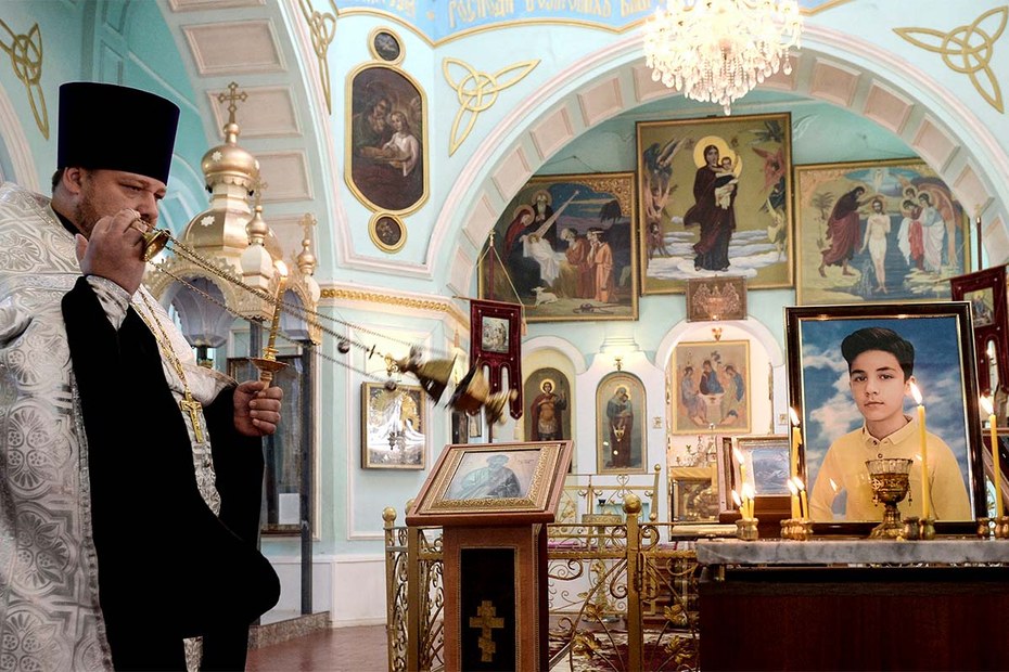 Ein orthodoxer Priester hält eine Gedenkzeremonie in Aserbaidschans zweitgrößter Stadt Ganja ab