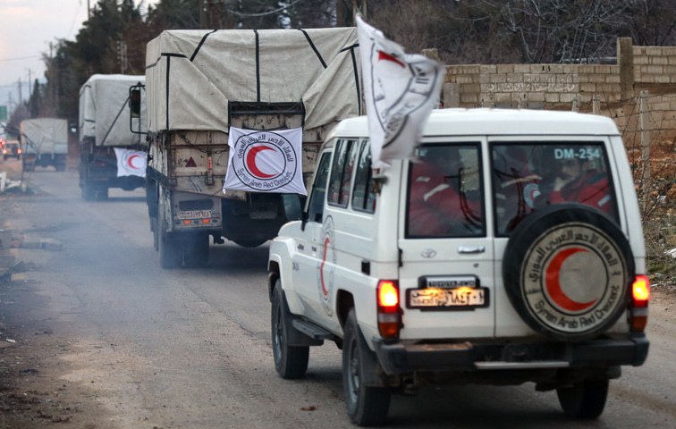 Hilfskonvoi am Rande der belagerten Stadt Madaja