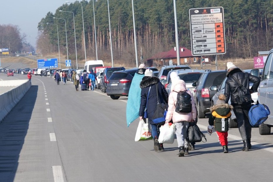 Flüchtlinge an der ukrainisch-polnischen Grenzen in Korczowa.